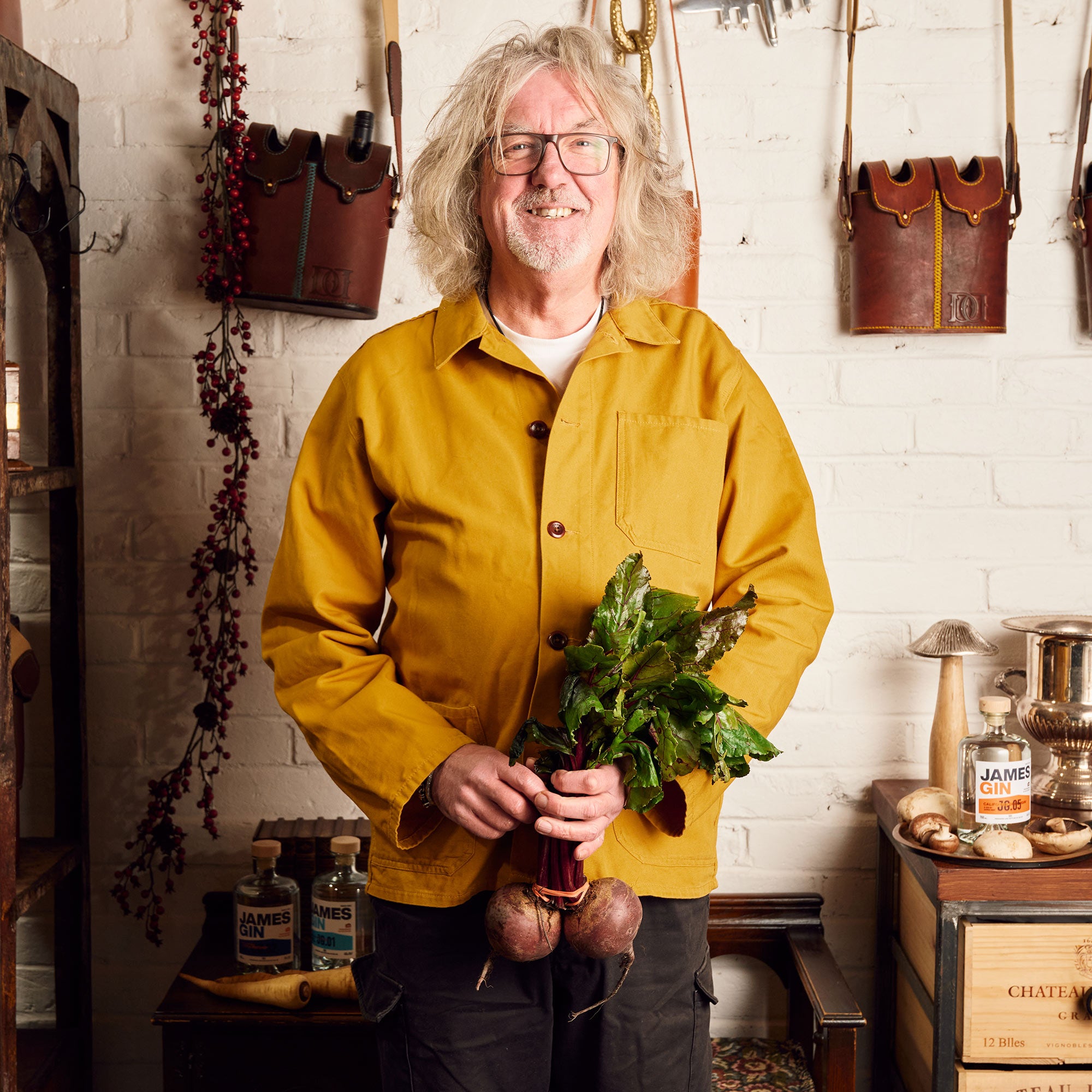 James May holding two beetroots in a playful and fun way