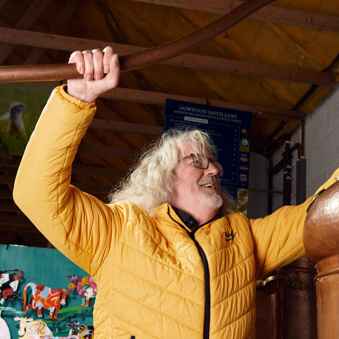 James May in his workshop using machinery to create his gin